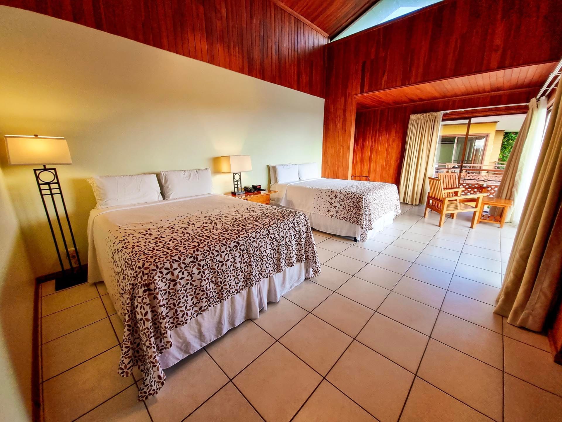 Interior of Deluxe Room with beds at Ficus Lodge