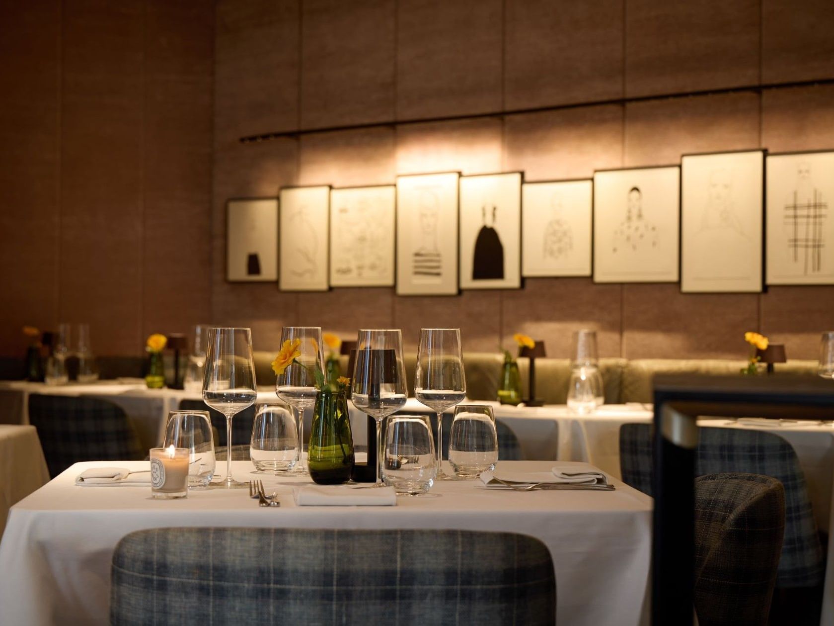 Dining table setup of Whitcomb restaurant at The Londoner Hotel