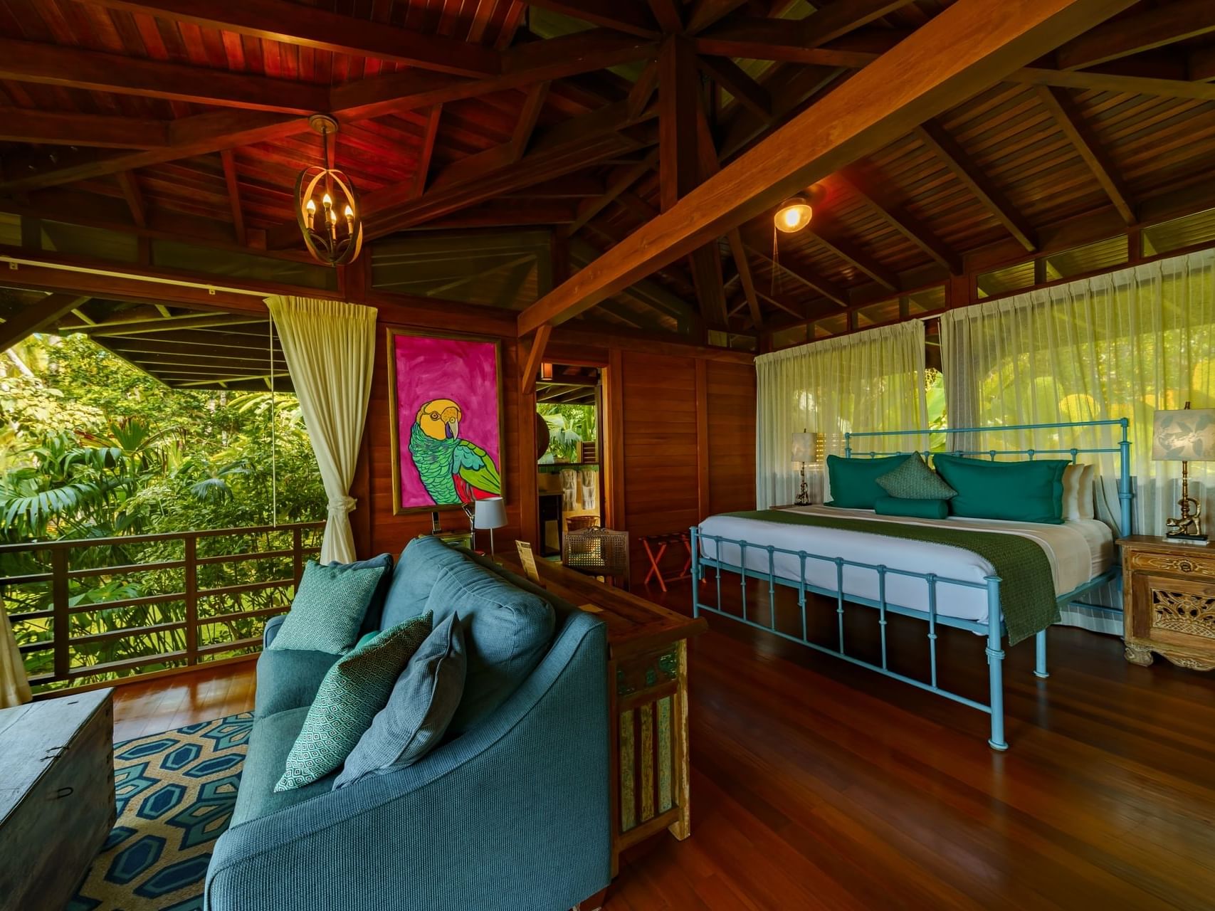 King bed & sofa in Ocean Front Casita at Playa Cativo Lodge