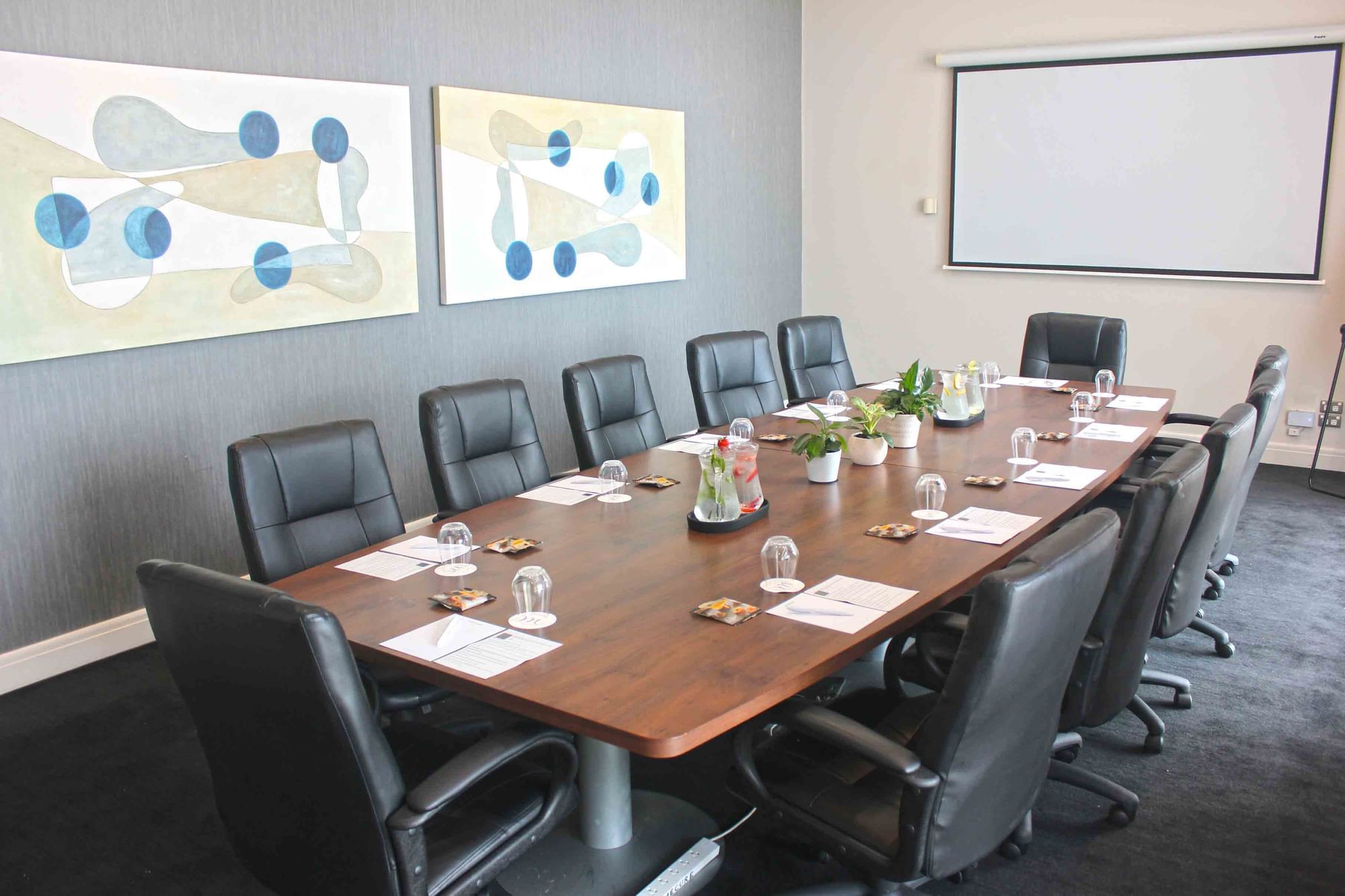 Boardroom 1 with projector and conference table setting at Mercure Kooindah Waters