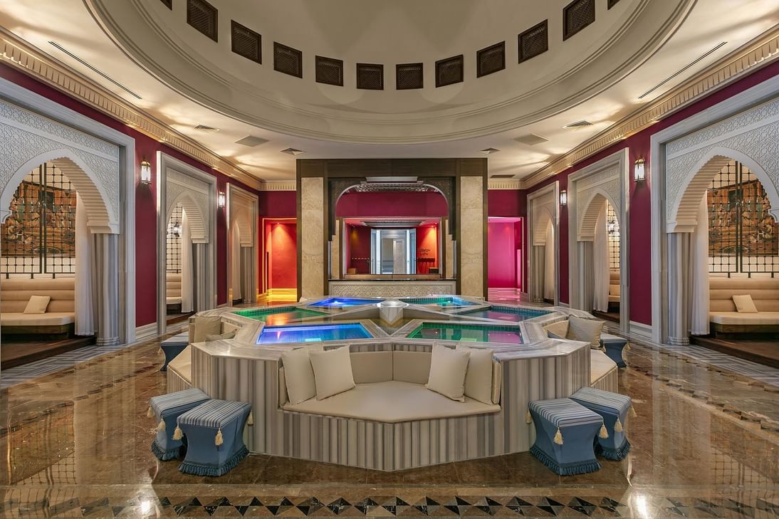 Spa interior with pools and elegant arches at Titanic Deluxe Golf Belek