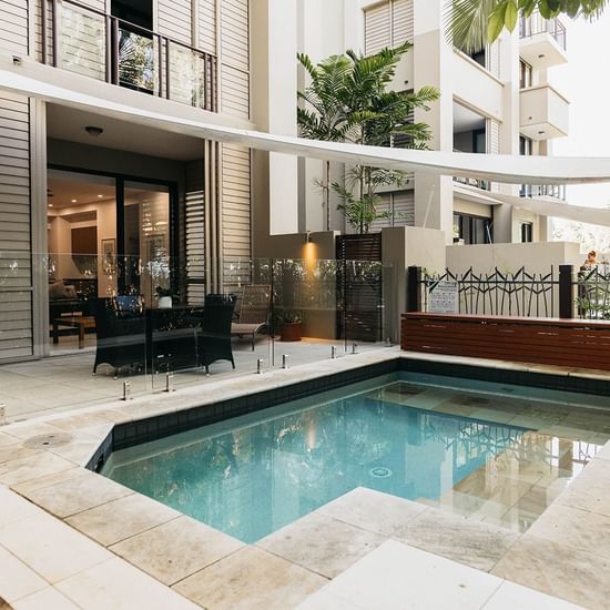 Mini pool, dining table at Pullman Palm Cove Sea Temple Resort