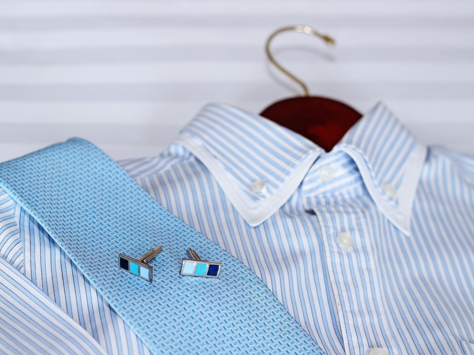 Shirt and tieon a hanger at the laundry of a City Seasons Hotel