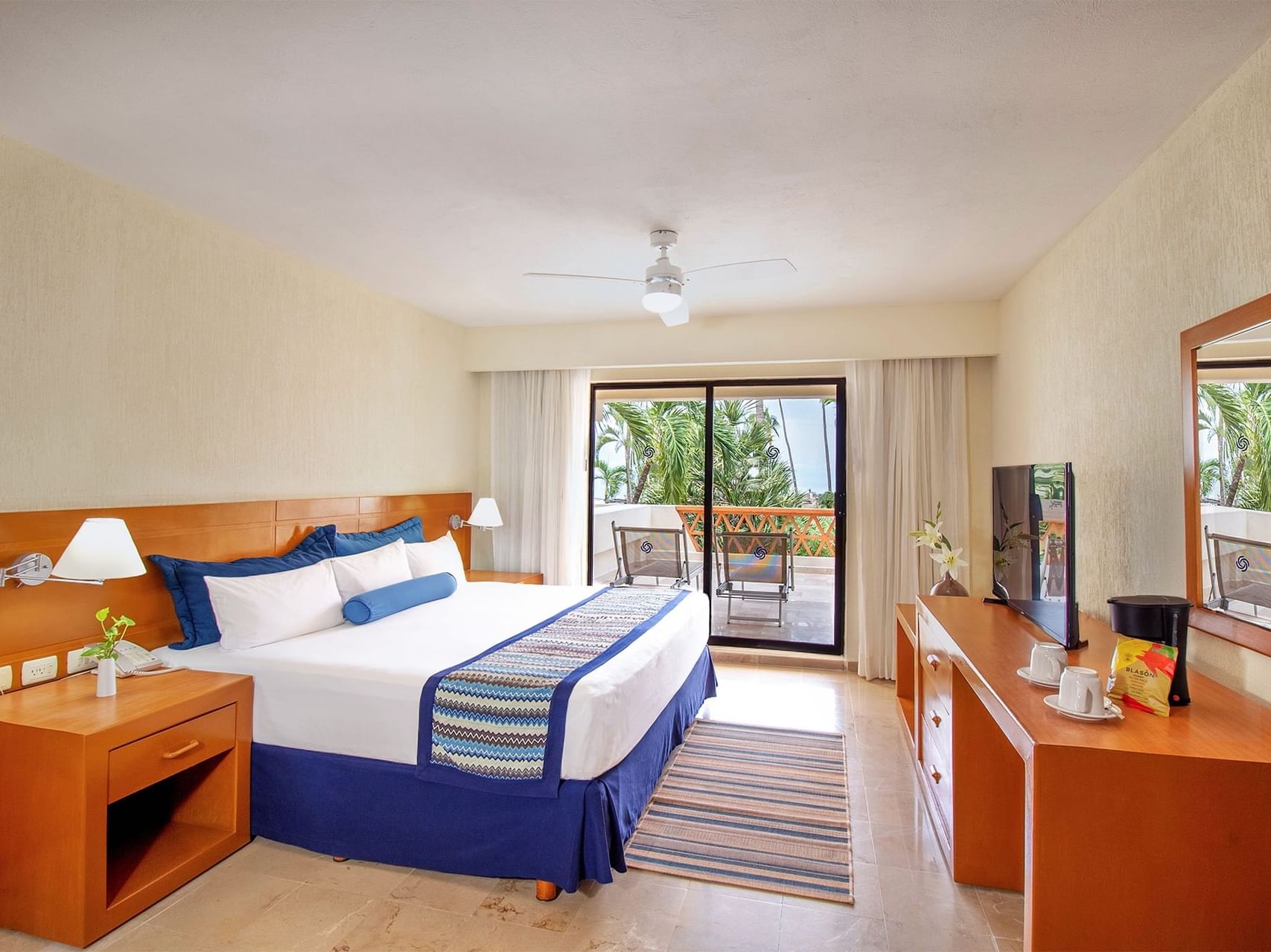 TV Cabinet facing the bed in Standard King Room at Plaza Pelicanos Grand Beach Resort