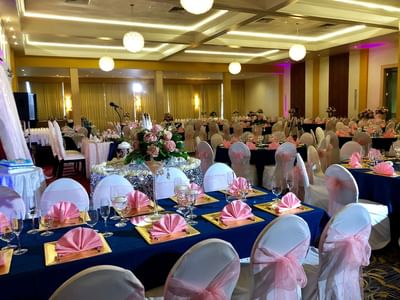 Arranged banquet rounds with cutlery at Pegasus Hotel Guyana