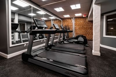 Fully equipped gym area in the Fitness Center at River Street Inn