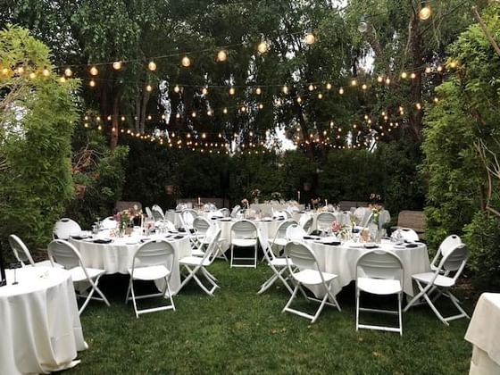Tables with white cloths in Preferred Vendors at Cambria Pines Lodge, a top pick for Cambria wedding venues