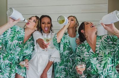 Bridesmaids are enjoying champagne at Bougainvillea Barbados
