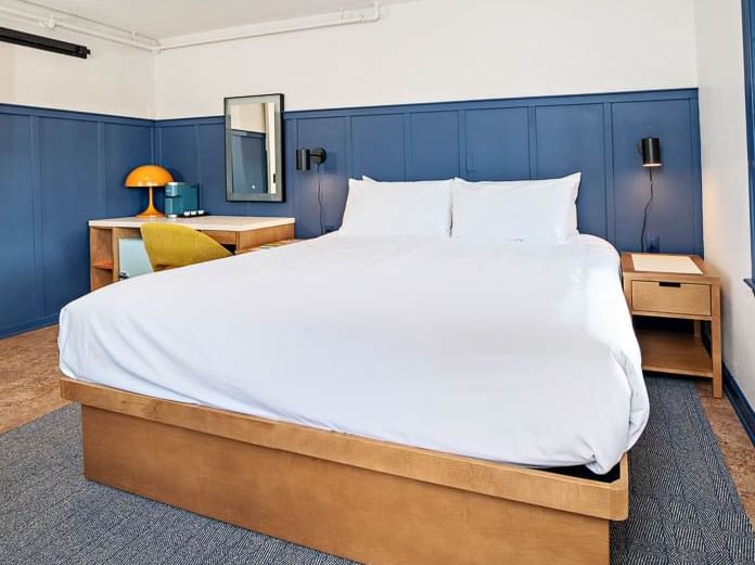 Bed & working desk at our full King Accessible Room at the Bardstown Motor Lodge in Kentucky.