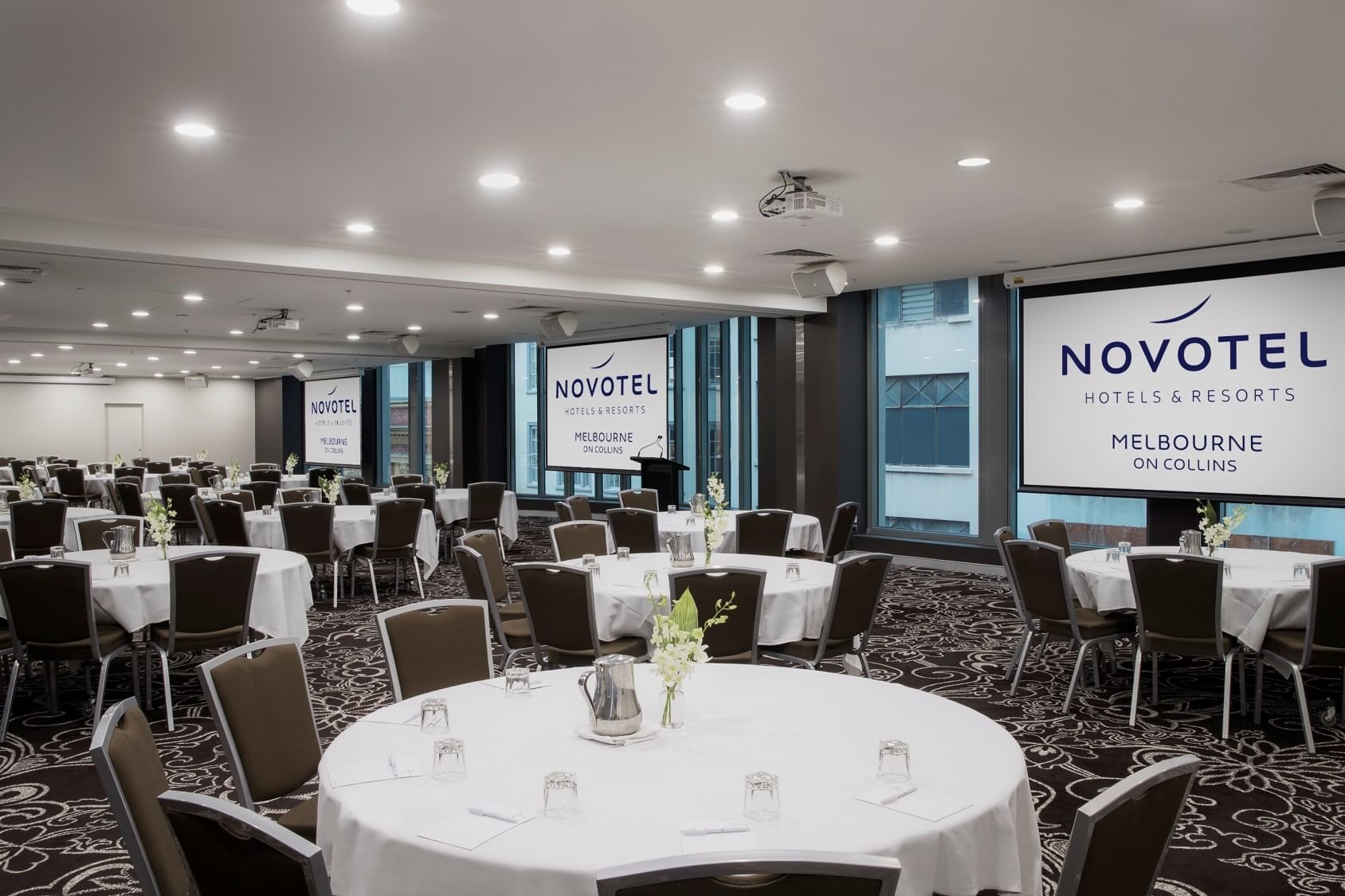 Banquet tables setup for meeting at Novotel Melbourne on Collin