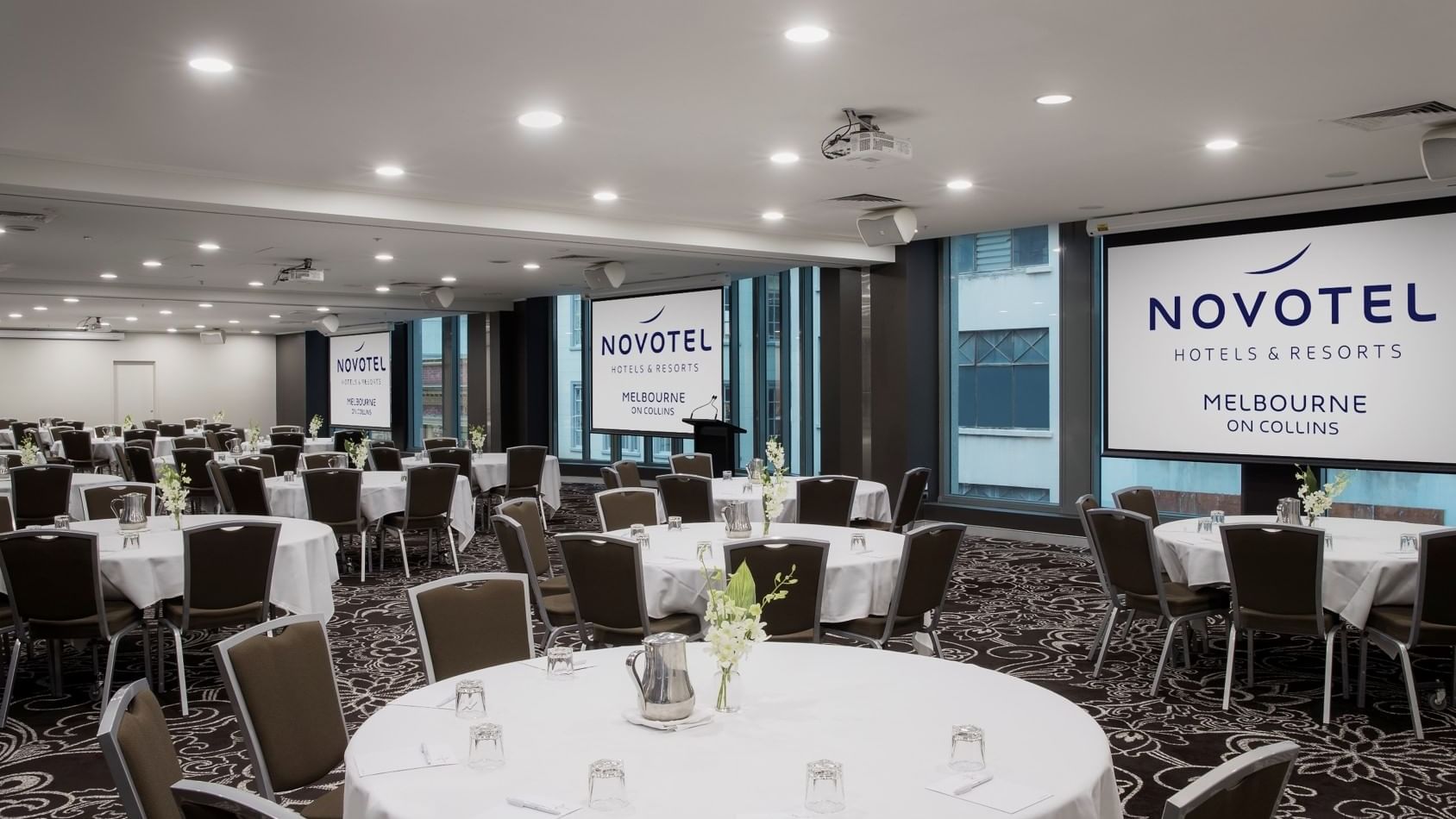 Banquet tables setup for meeting at Novotel Melbourne on Collin