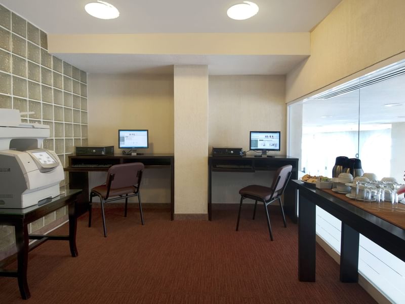 Interior view of the business center at Fiesta Inn Hotels