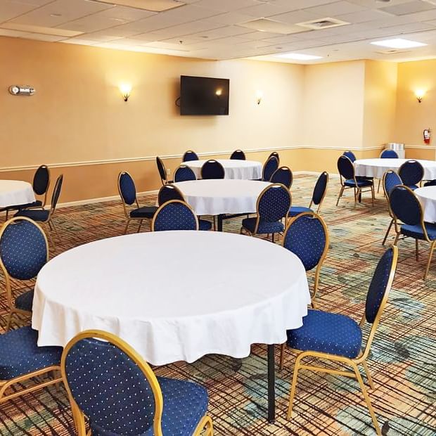 Banquet set-up in a meeting room with carpeted floors at Lake Buena Vista Resort Village & Spa