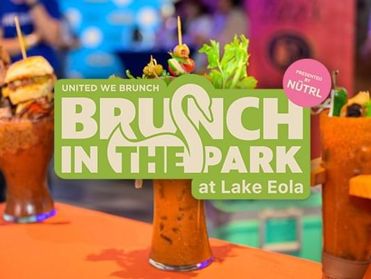 Beverages served on the table with Lake Eola Park poster used at Lake Buena Vista Resort Village & Spa