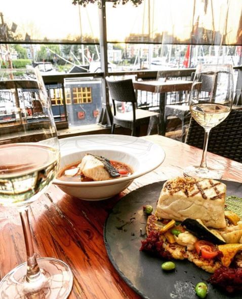 Delicious Grilled fish & wine at Granville Island Hotel
