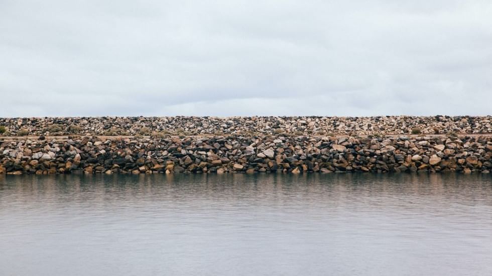 Stone walls by the sea of Mengkuang Dam near Sunway Hotel Seberang Jaya