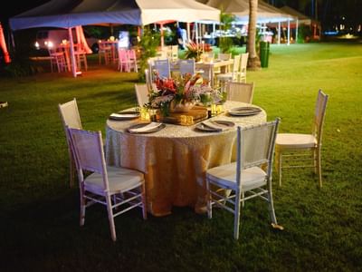 Banquet table set up in a Villa Gardens at Copamarina Weddings