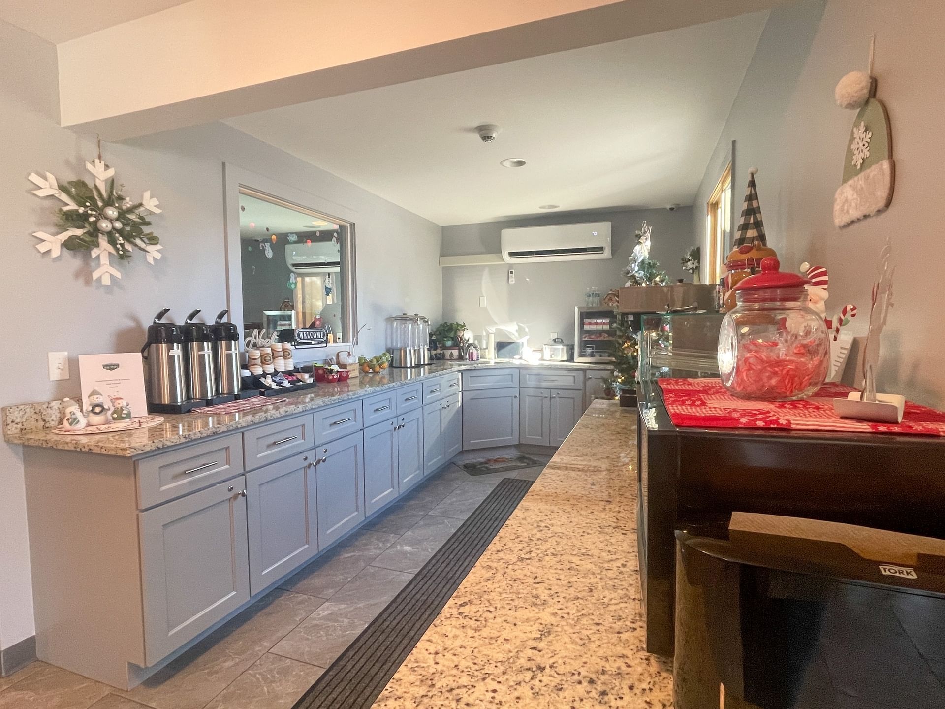 Kitchen area with coffee station, breakfast supplies & Christmas decorations in a room at The Inn at Canaan