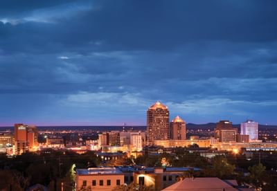 A distant view of the city near Hotel Parq Central at night