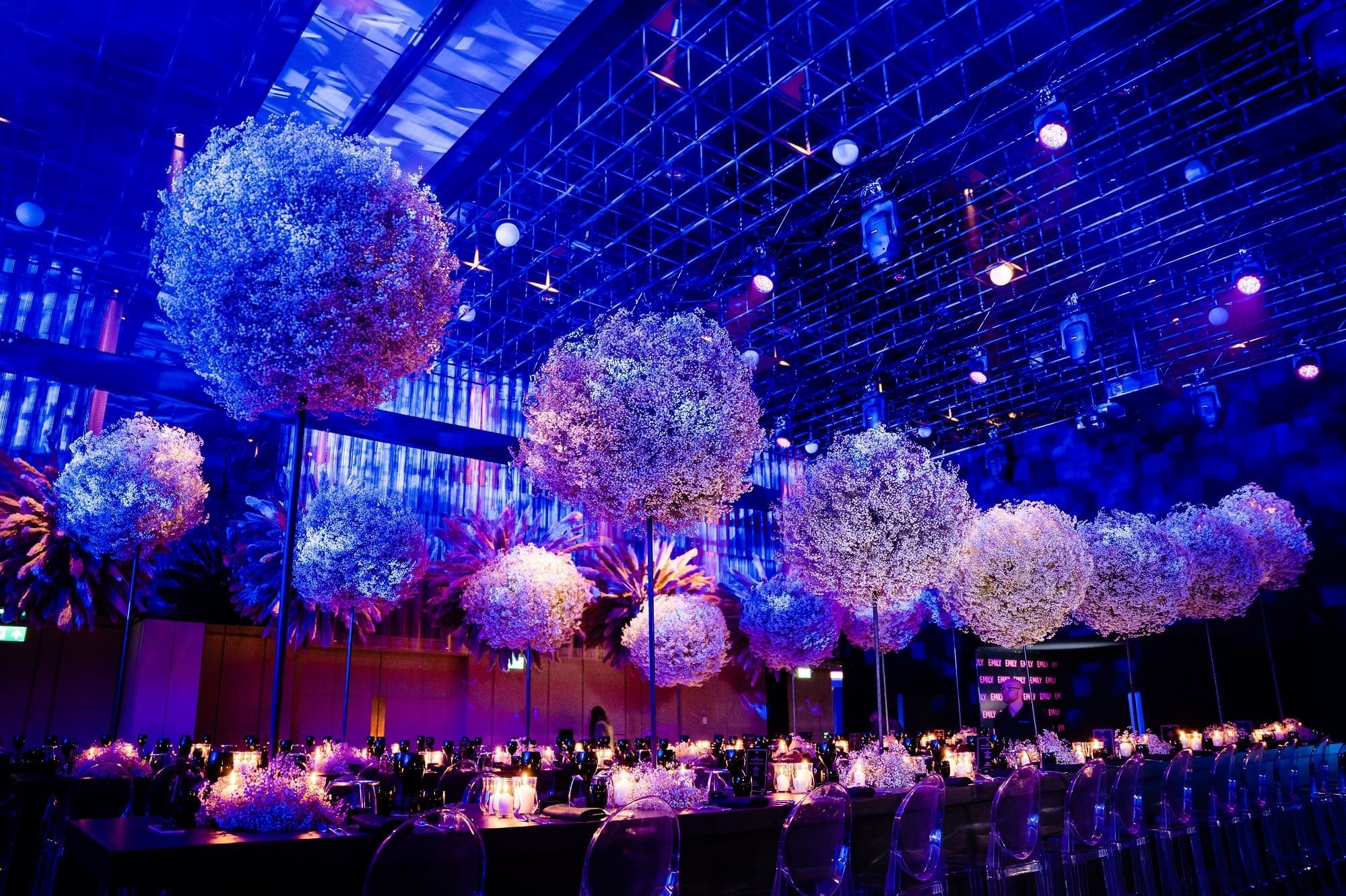 Dining area arranged with decorations in The Ballroom at The Londoner Hotel