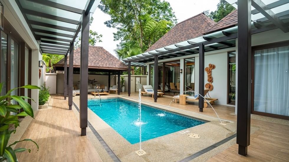 Royal Villa courtyard with private pool, water features, and covered walkways at The Banjaran Hotsprings Retreat, Ipoh