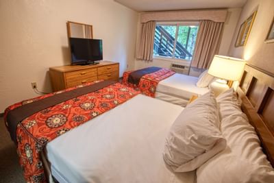 View of bedroom with two beds at Wedgewood Resort 