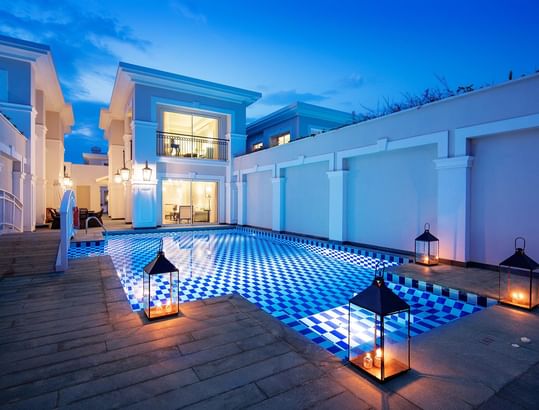 Exterior view of the Lagoon Duplex Suite with Private Pool and the outdoor pool at Titanic Deluxe Golf Belek