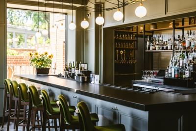 Interior of a bar counter in Taproot Tavern at Hotel Weyanoke