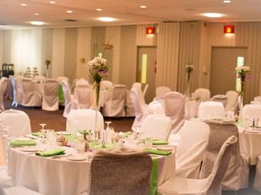 Dining tables arranged in Lodge Banquet Rooms at Fairmont Hot Springs Resort