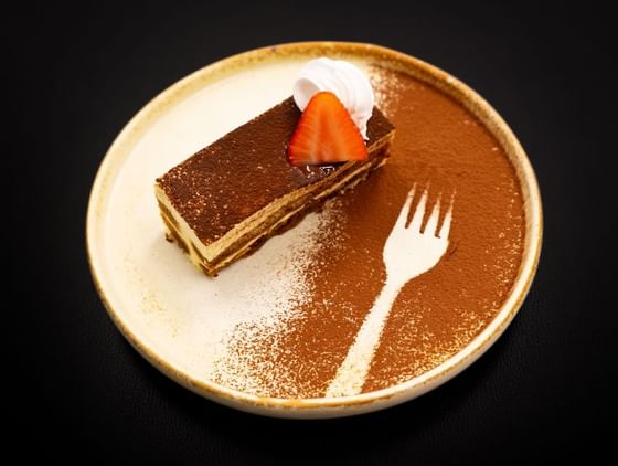 Tiramisu served with strawberry piece at Amara Hotel BKK
