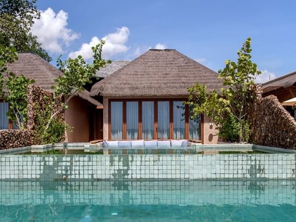 Lounge & private pool in a villa at U Hotels and Resorts