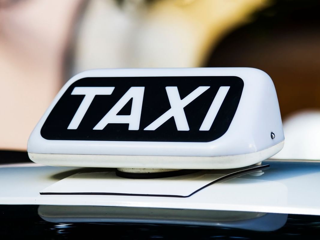 Close-up of the Taxi sign on a cab at Nesuto St Martins