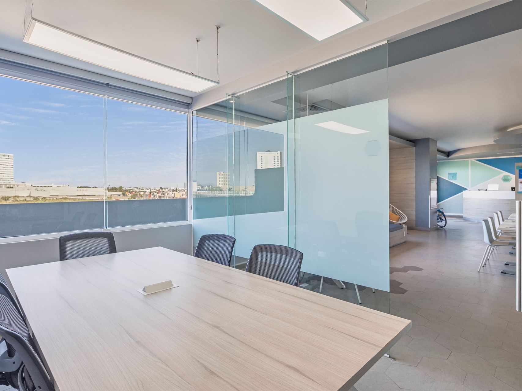 Boardroom table with view in a Meeting Room at One Hotels