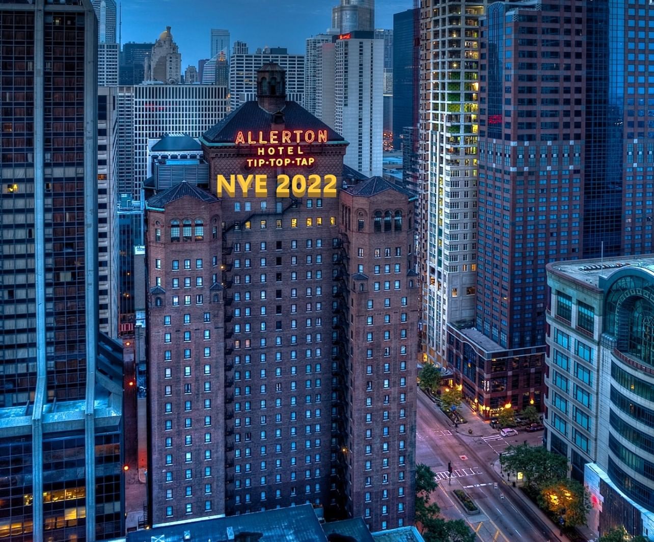 High-angle shot of Warwick Allerton - Chicago Hotel's neon sign at night