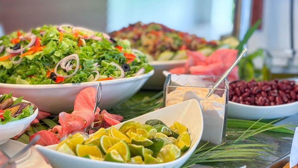 Various dishes and condiments displayed at Nukunuku Restaurant & Bar, The Naviti Resort - Fiji in Korolevu.
