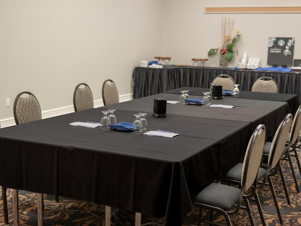 Event room with tables and chairs.
