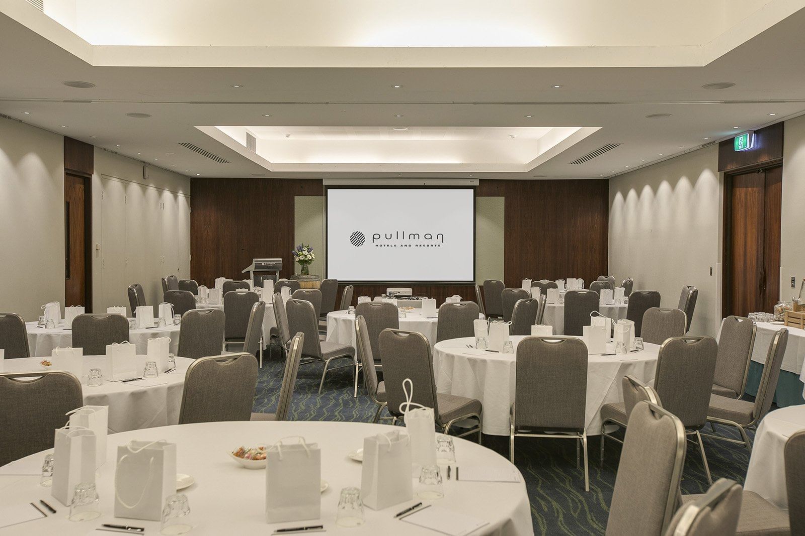 Banquet tables setup for a Meeting at Pullman Bunker Bay Resort