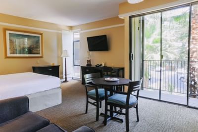 Dining table for 2 in Deluxe Room at Dinah's Garden Hotel