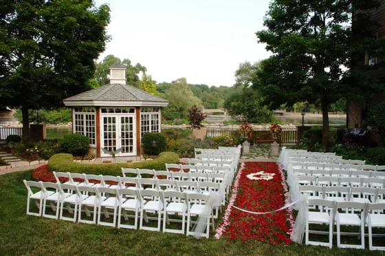 chairs and roses at outdoor wedding reception