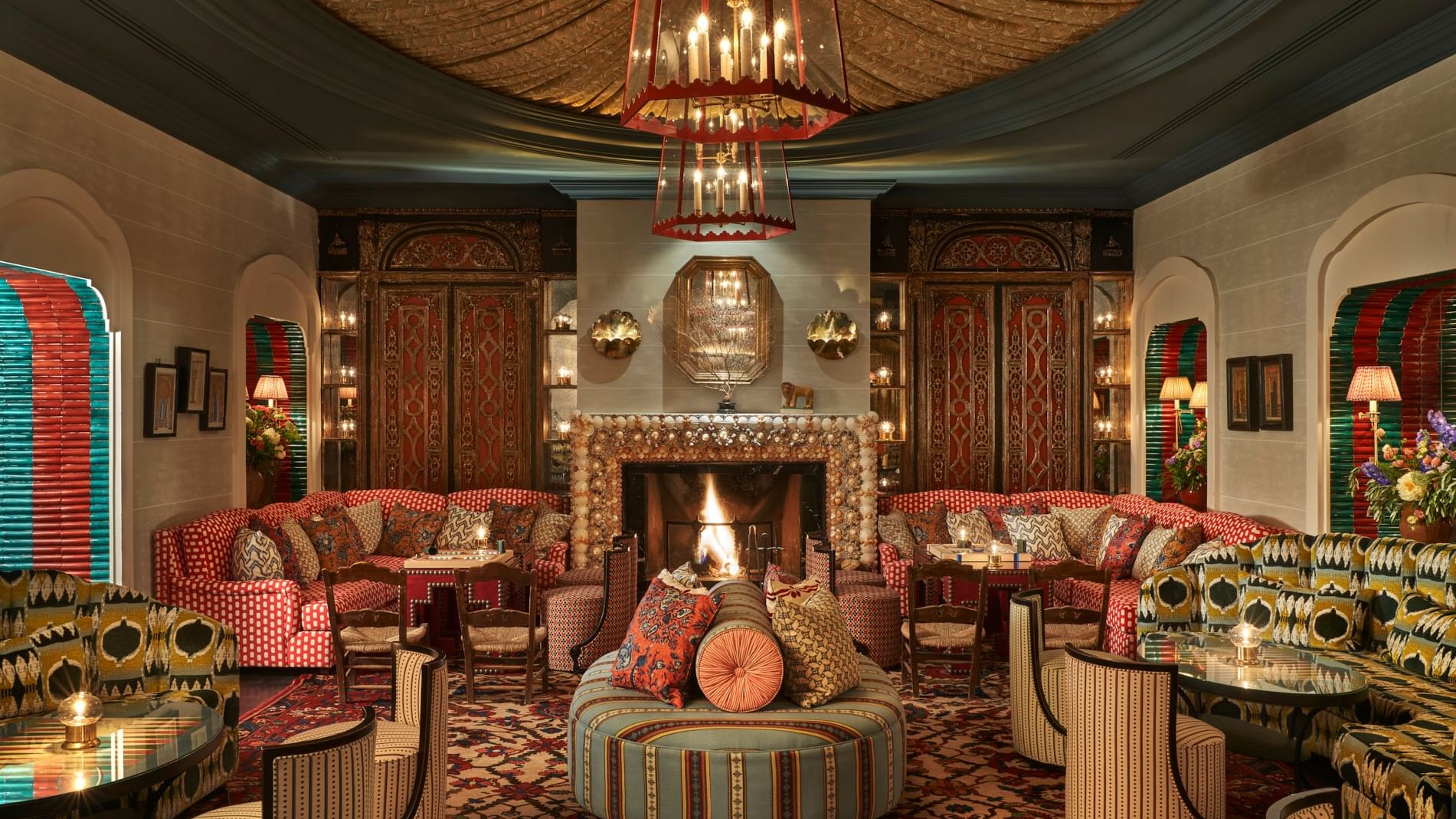 Cozy interior with fireplace and stylish furniture at Rudi's, Marbella Club, Marbella.
