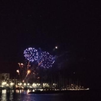 View of illuminated Hilton Hawaiian Village with Fireworks near Waikiki Resort Hotel by Sono