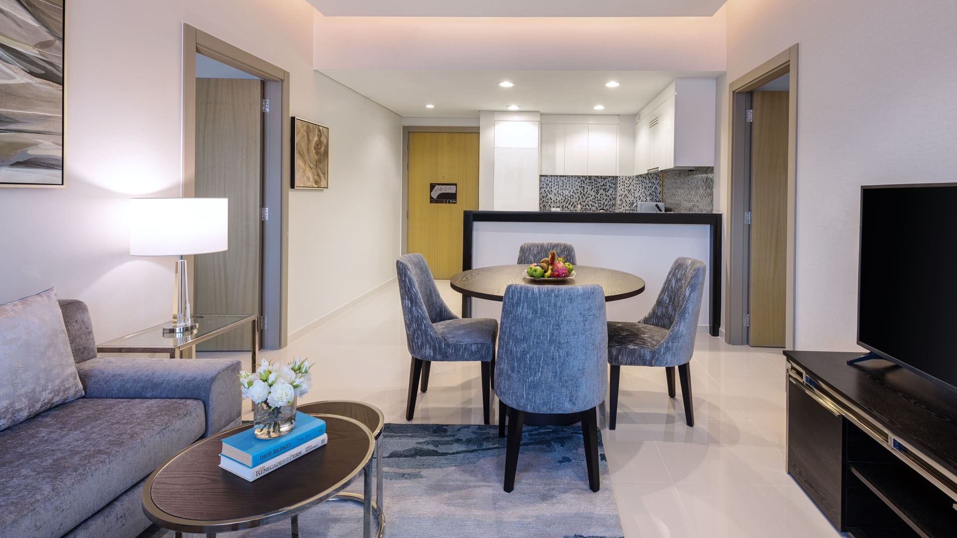 Living area with a dining table in One Bedroom at DAMAC Maison Aykon City Hotel Apartments