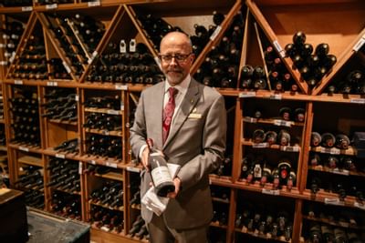 A sommelier at the Wine Cellar at Stein Eriksen Lodge