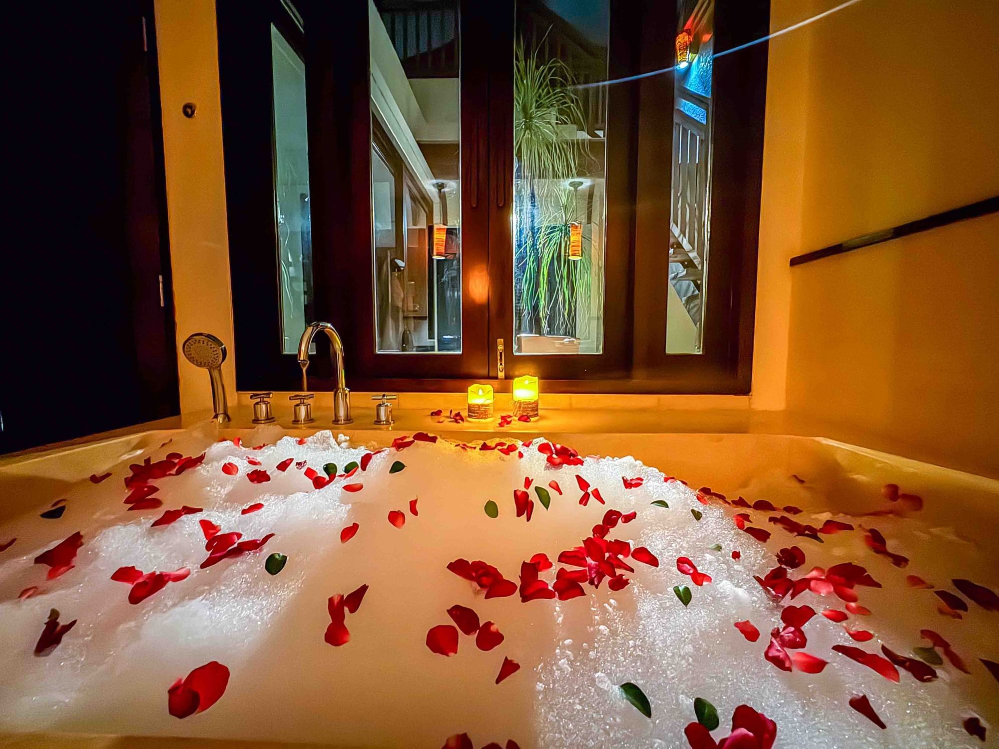Bathtub decoration with roses and candles