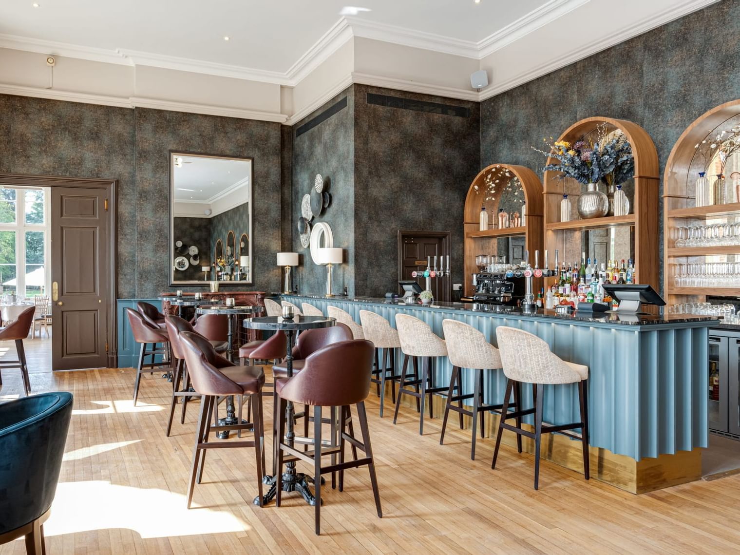 Bar area with bar stools at Easthampstead Park Hotel