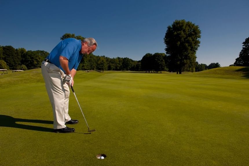 Gentleman playing golf at Pomperaug Golf Club