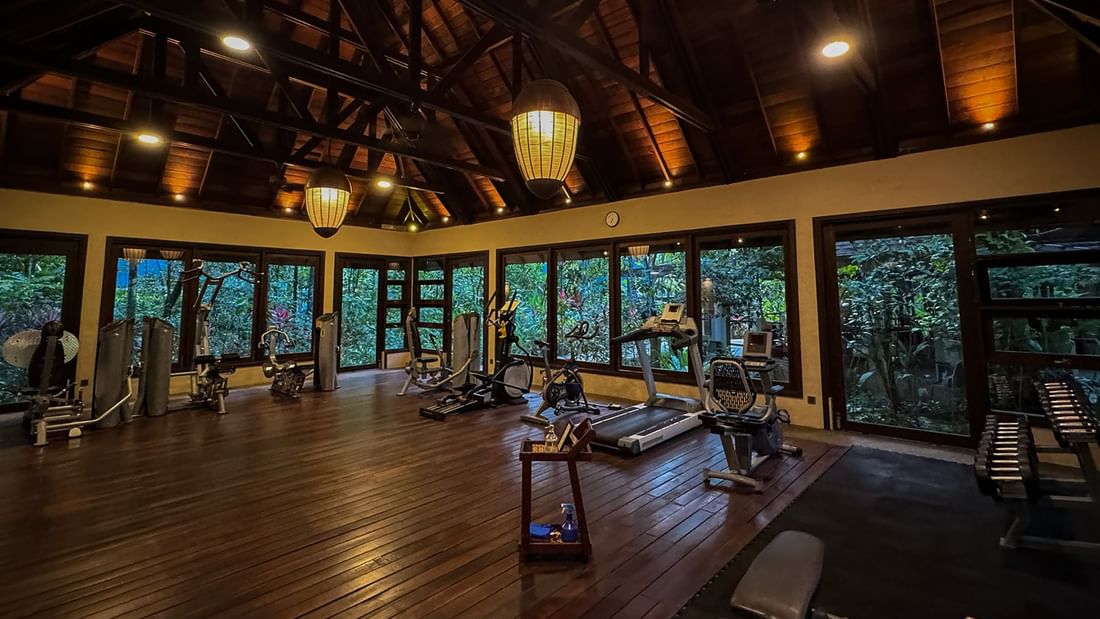 Fitness Centre with wooden flooring and gym equipment at The Banjaran Hotsprings Retreat