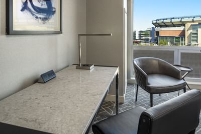 room with desk and accent chair