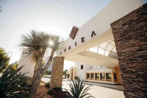 Exterior view of the entrance at Araiza Hotels in the day