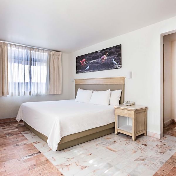 Comfy king bed in Executive Room Dog Friendly at Gamma Hotels